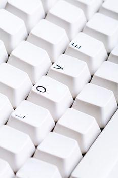 Word LOVE on computer keyboard with empty space on other buttons. May be used as symbol of love on the Internet, love e-mail letters.