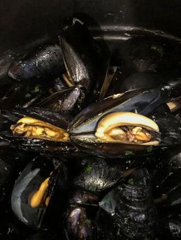 Some tasty mussels being prepared during cooking