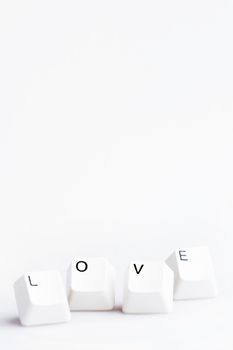 Word LOVE on computer keyboard's buttons. May be used as symbol of love on the Internet, love e-mail letters.