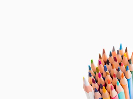 Bunch of colorful watercolor pencils on white background. School supplies. Kid's stationery with copy space. Back to school backdrop.