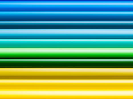 Horizontal row of yellow, green and blue watercolor pencils. School supplies background. Kid's stationery. Back to school backdrop with abstract rainbowgradient lines.