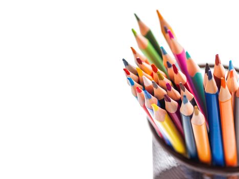 Bunch of colorful watercolor pencils on white background. School supplies. Kid's stationery with copy space. Back to school backdrop.
