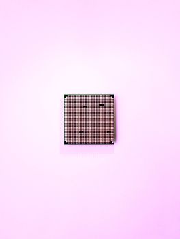 Central computer processor. CPU on light blue background. Technological detail of personal computer. Top view, flat lay.