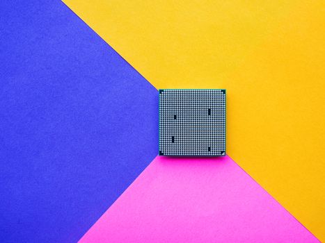 Central Computer Processor. CPU on geometric background. Colorful copy space. Technological detail of personal computer.