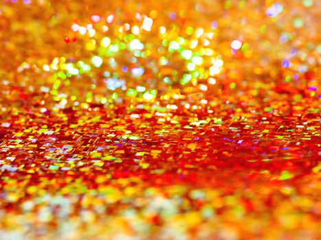 Bright red background. Shiny and sparkling holographic rainbow backdrop.