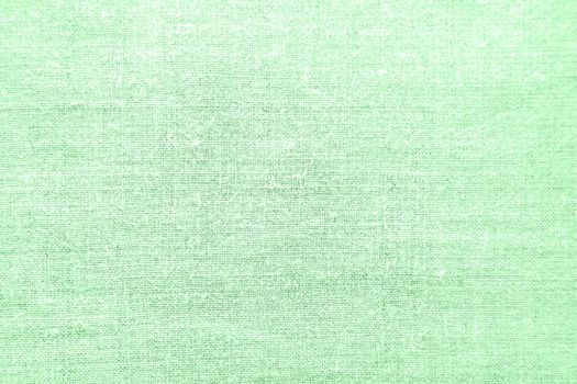 Homespun linen fabric in color of neo mint. Abstract textile background.