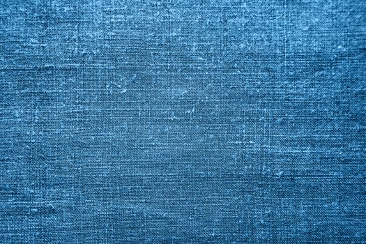 Homespun linen fabric. Textile texture. Classic blue abstract background. Top view, flat lay.