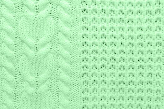 Abstract knitted background. Wool neo mint colored sweater texture. Close up picture of knitted pattern.