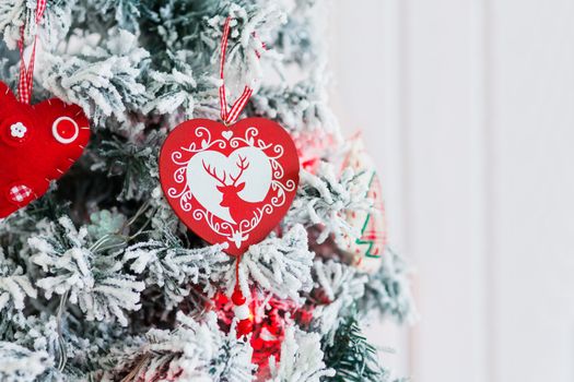 Christmas and New Year background with Eve Tree and decorations. Cozy holiday morning at home.