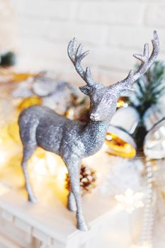 Christmas and New Year decorations with silver deer. Holiday winter background.