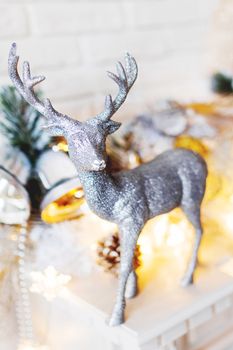 Christmas and New Year decorations with silver deer. Holiday winter background.