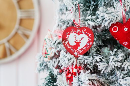 Christmas and New Year background with Eve Tree and decorations. Cozy holiday morning at home.
