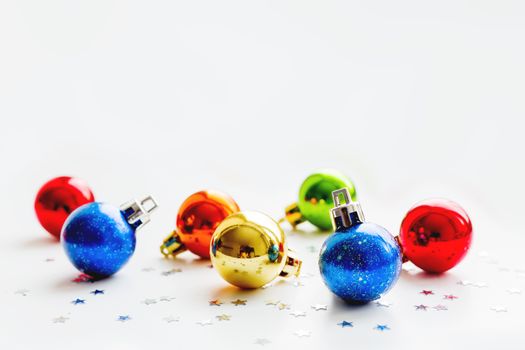 Christmas and New Year background with colorful decorative balls for Christmas tree. Place for text.