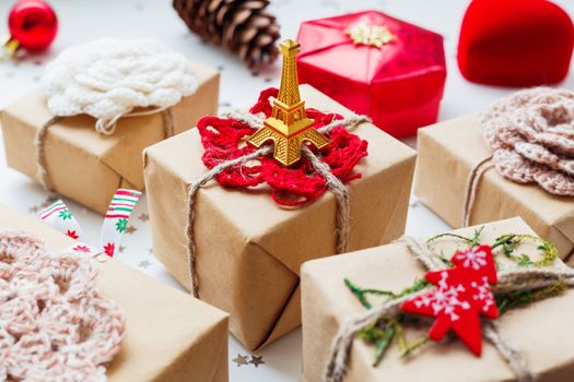 Christmas and New Year background with presents and decorations. Symbol of Paris and France - Eiffel tower.