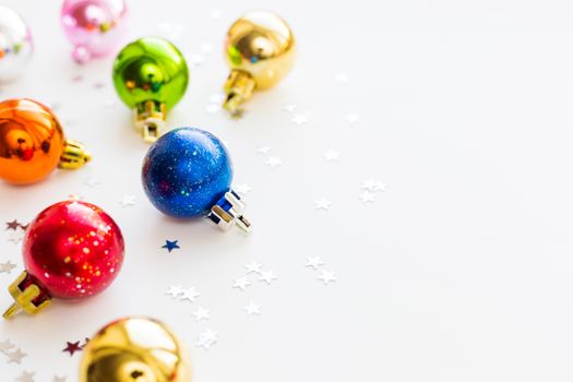 Christmas and New Year background with colorful decorative balls for Christmas tree. Place for text.