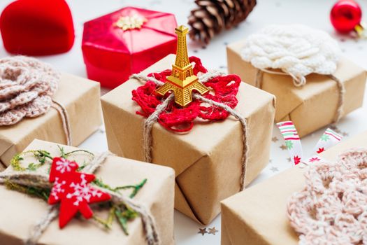 Christmas and New Year background with presents and decorations. Symbol of Paris and France - Eiffel tower.