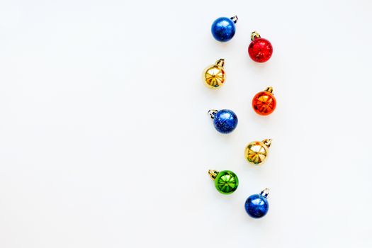 Christmas and New Year background with shiny colorful balls. Flay lay, top view. Place for text.
