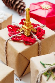 Christmas and New Year background with presents and decorations. Symbol of Paris and France - Eiffel tower.