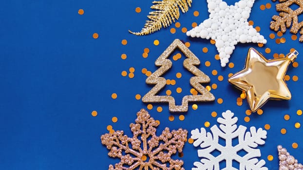 Banner with golden and white decorations for Christmas tree. New Year decorative stars and snowflakes on classic blue background.