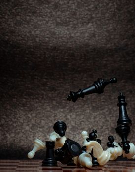 Chess board game. Business strategy management and success concept. Teamwork with competition and success strategic. Chess clash, bounce off on a board. Turn over chess board. Pieces of chess. Defeat.