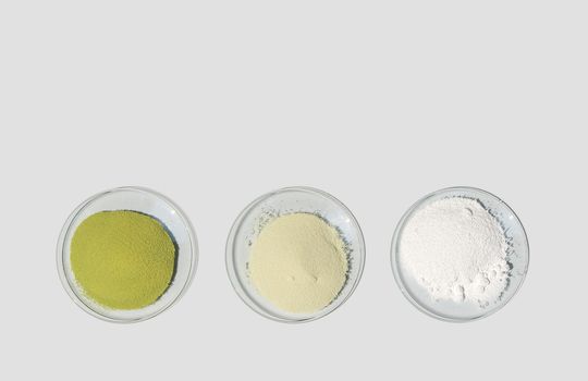 Cosmetic chemicals ingredient on laboratory table. Optiblanc MBT, Optiblanc 2M/G, Polygel K100. (Top View)
