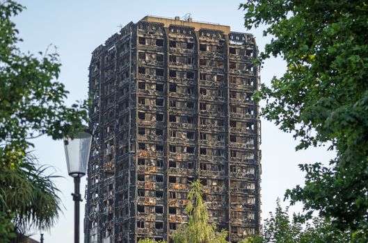 Charred remains of the Grenfell Tower block of council flats in which at least 80 people are feared to have died in a fire, Kensington, West London. 