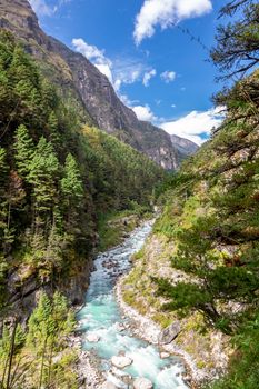 suspention bridge on the Everest Base Camp Trek, Himalaya mountains, Sagarmatha National Park, Nepal. Amazing river.