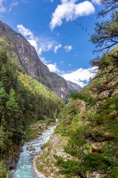 suspention bridge on the Everest Base Camp Trek, Himalaya mountains, Sagarmatha National Park, Nepal. Amazing river.