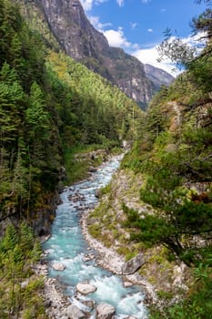 suspention bridge on the Everest Base Camp Trek, Himalaya mountains, Sagarmatha National Park, Nepal. Amazing river.