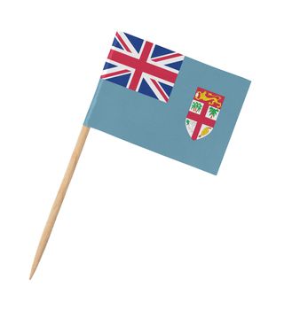 Small paper flag of Fiji on wooden stick, isolated on white