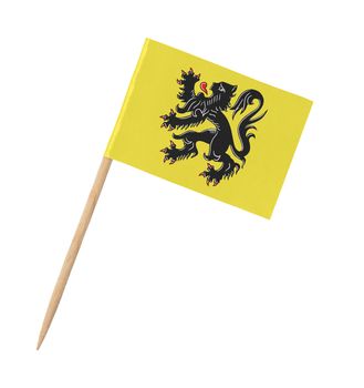 Small paper flag of Flanders on wooden stick, isolated on white