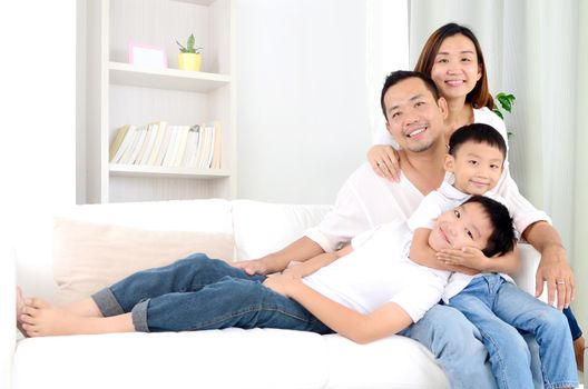 happy asian family parent spending time with their children during coronavirus pandemic time.