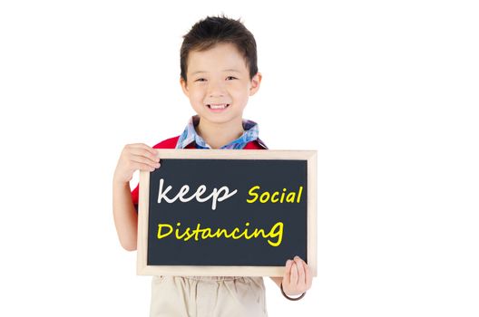 Asian boy is holding board that show text " Keep Social Distancing,