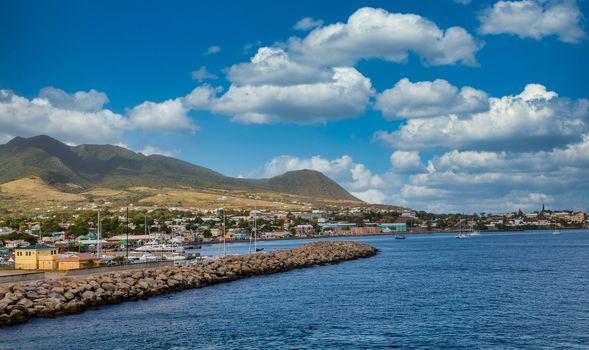 Rock seawall protecting harbor on St Kitts