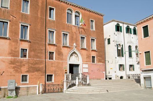 Italian government offices in the historic Campo Sant' Anzolo in Venice, Italy.  The Corte dei Conti financial court is based here together with the regional immigration office and other bodies. Sunny summer morning.