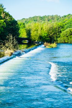 The River Leven weir on a sunny day in Sept UK