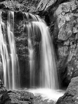 Monochrome time exposure of Kilgore Falls at Rocks State Park near Pylesville, Maryland.