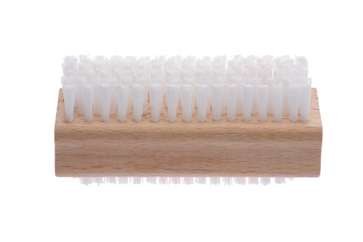 A side view of traditional wooden nail brush