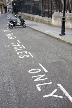 A London Bell Yard WC2 parking bay for solo motorcycles and scooters only with one scooter