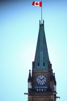 The upper portion of the Peace Tower, a clock tower attached to the Centre Block of the Canadian parliament buildings in the capital city of Ottawa, Ontario.