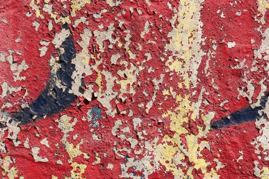 Old Weathered Graffiti Wall. Colorful Concrete Wall Fragment. Red.