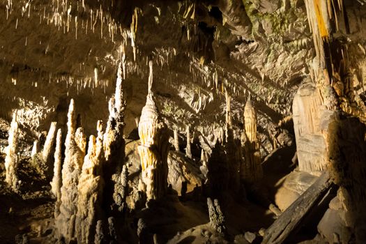 Postojna cave, Slovenia. Formations inside cave with stalactites and stalagmites