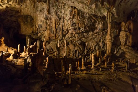 Postojna cave, Slovenia. Formations inside cave with stalactites and stalagmites