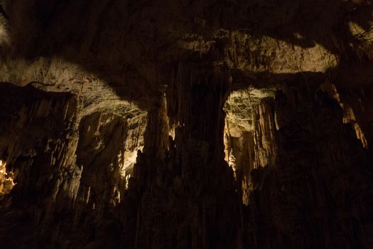 Postojna cave, Slovenia. Formations inside cave with stalactites and stalagmites