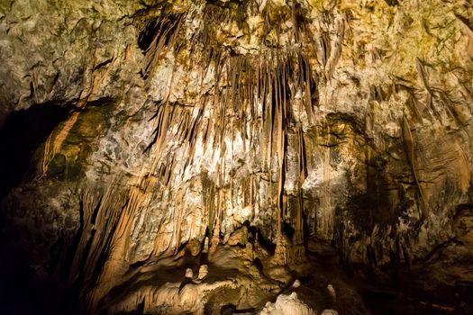 Postojna cave, Slovenia. Formations inside cave with stalactites and stalagmites