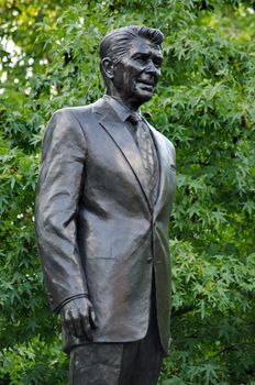 LONDON, UK - JULY 25, 2017:  Memorial statue of President Ronald Reagan in Grosvenor Square, Mayfair, London.  Created by American sculptor Chas Fagan it has been on public display since 2011.  
