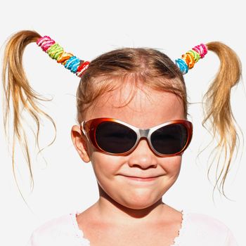 portrait of a little girl in sunglasses