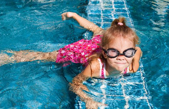 little girl in the pool  