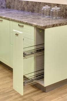 Fragment of a kitchen interior with drawers