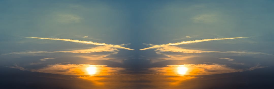 Abstract Panoramic sunset with fluffy clouds in the twighligth sky